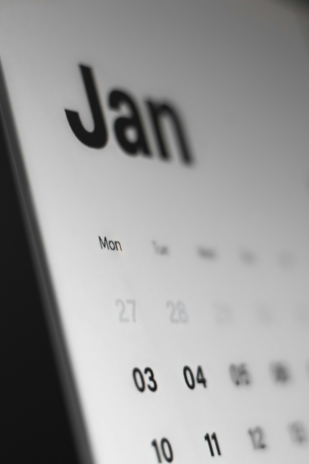 Digital calendar on a screen shows January dates.